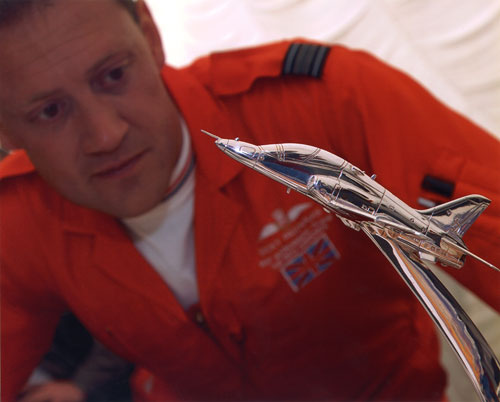 In 2005 we were proud to be invited to the Royal International Air Tattoo as guests of the RAF Benevolent Fund. As guests we met the Red Arrows who were fascinated by our solid silver model of the BAE Systems Hawk, the aircraft which they fly in their aerobatic displays to delight crowds at airshows across the UK.
