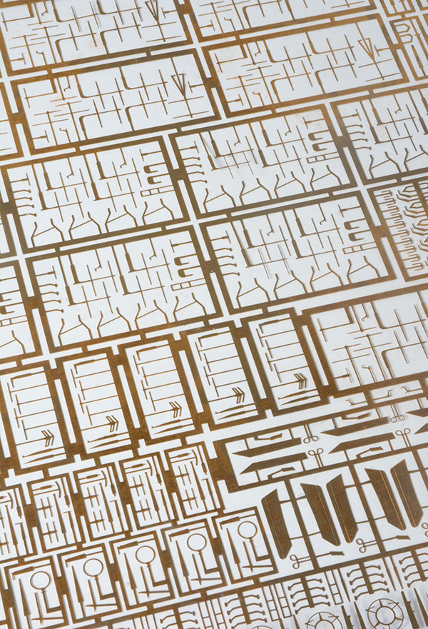 Fine detailed parts such as radar aerials are created using a method called photoetching. These must be inserted with tweezers due to their delicate nature.