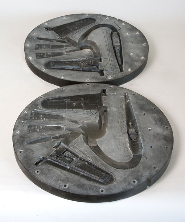 Vulcanised rubber production moulds are made for casting using the completed metal masters. Only then can the aircraft or tank model be cast in pewter.